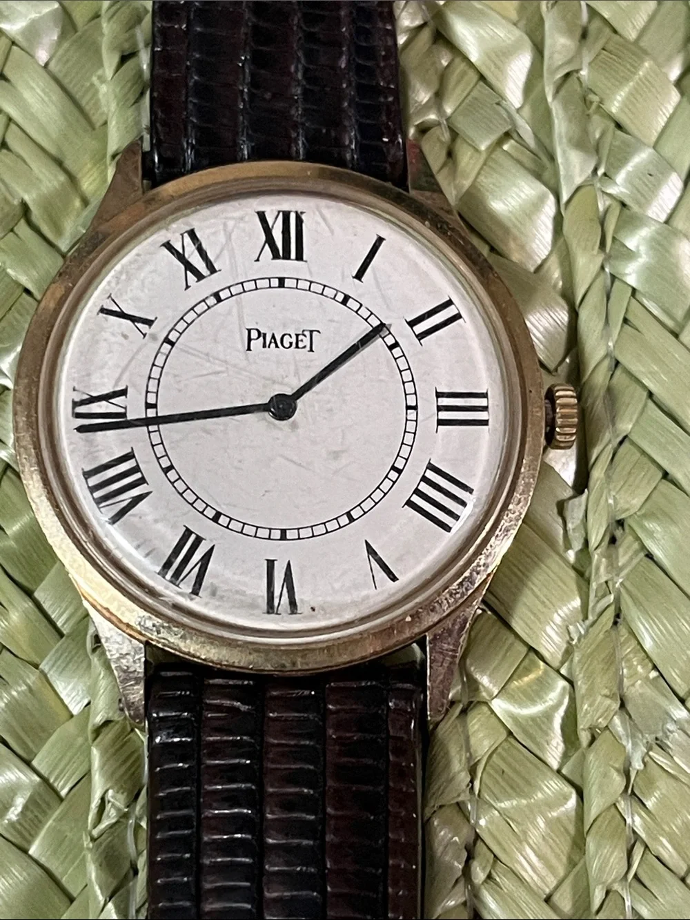 Piaget Silver Case Watch with Black Leather Strap and White Dial